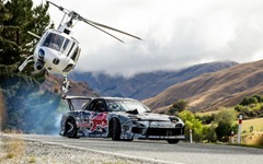 Mazda-RX-7-Red-Bull-drift-car-front-three-quarter-with-helicopter